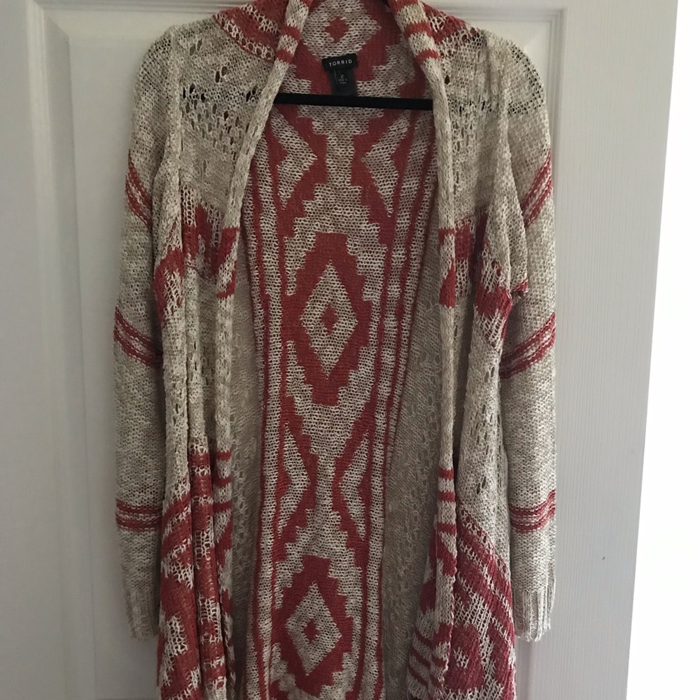 Plus size, rust and tan sweater shawl.